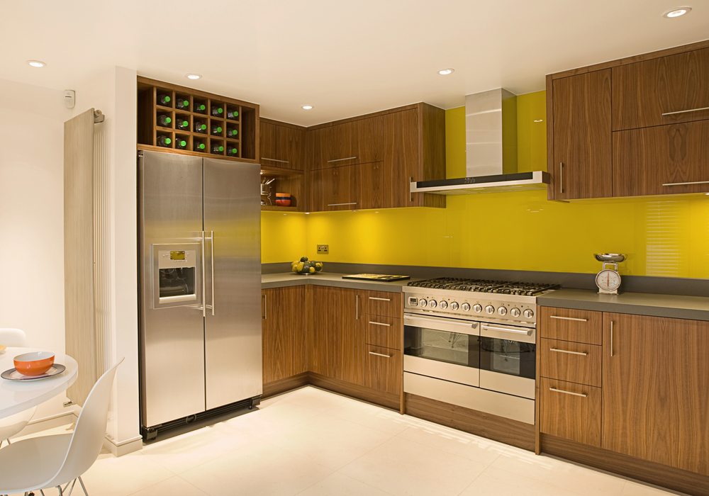 Contemporary kitchen with a yellow splashback